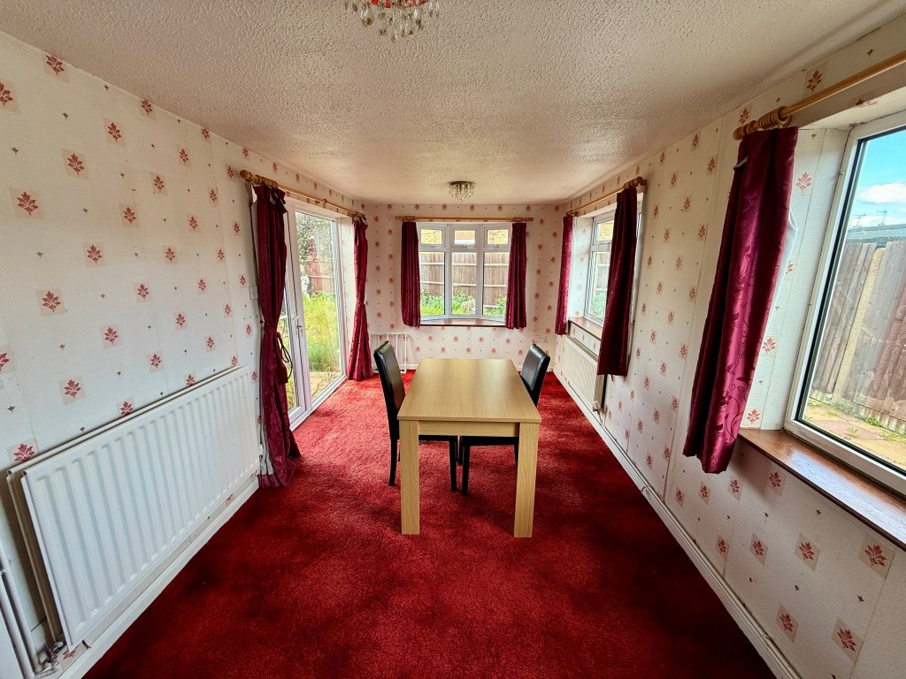 Lot: 106 - THREE-BEDROOM EXTENDED BUNGALOW FOR IMPROVEMENT - Dining room